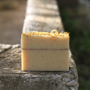 orange, clove, turmeric, calendula, red clay goat milk soap for private label